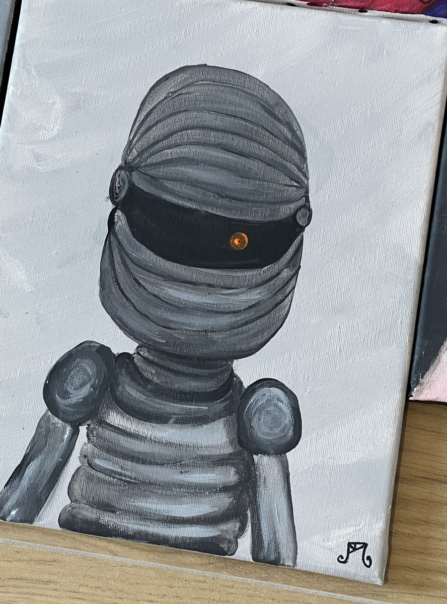Anche i Robot escon male nelle fototessere